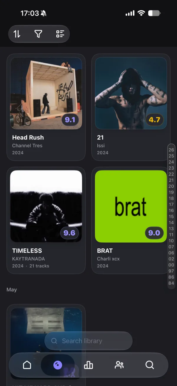 Library, a grid of rated albums with scores on every cover